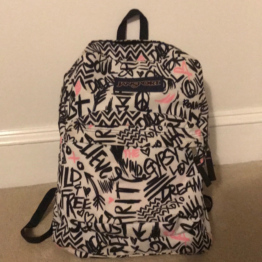Cute pink, black, and white jansport book bag